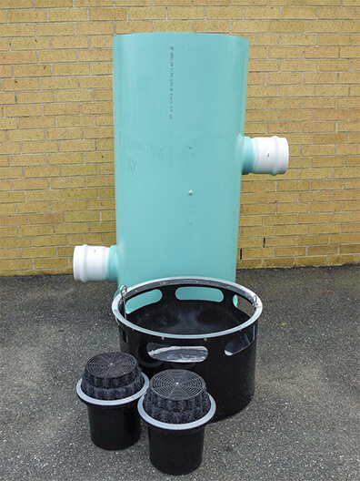 below ground downspout cartridge based stormwater filter system