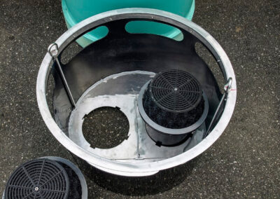 fabco industries downspout stormwater filter system cartridge basket close up