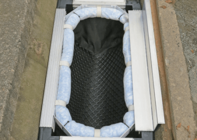 fabco industries stormsack plus geotextile stormwater filter system with oil boom installed
