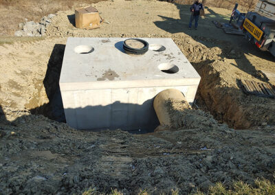 precast stormwater filtration vault installation in ground
