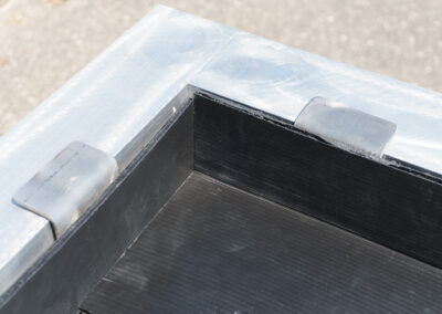 fabco industries ready-fit stormsack corner flanges close up