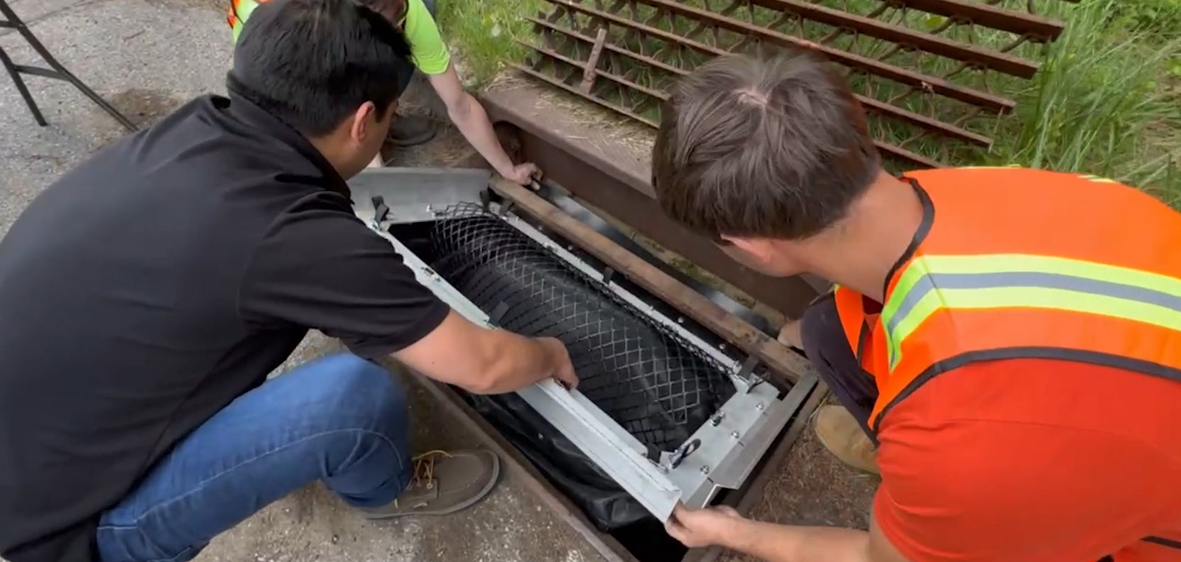 Drop the filter in the catch basin resting on the grate frame ledges